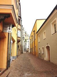 Narrow alley along buildings