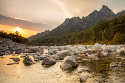 Scenic view of mountains against sky during sunset