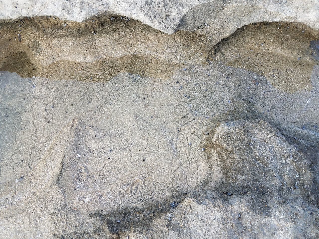 FULL FRAME SHOT OF ROCKS ON LAND