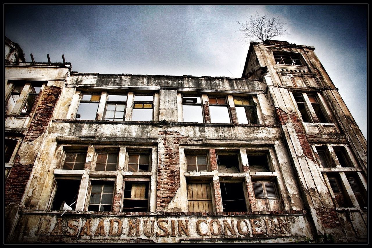 architecture, built structure, building exterior, low angle view, transfer print, window, auto post production filter, sky, old, building, abandoned, exterior, day, history, damaged, outdoors, residential building, city, no people, facade