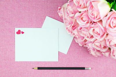Directly above shot of pink rose on table