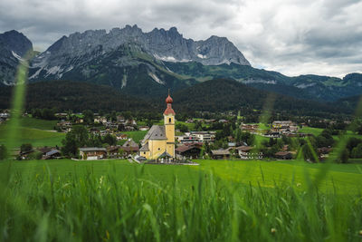 Church in ellmau. village of going. wilden kaiser mountains in background. tirol, alps, austria