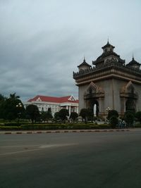 Built structure against cloudy sky
