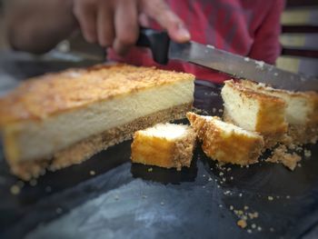 Close-up of man preparing food