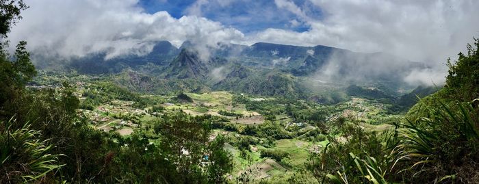 Panoramic view of landscape against cloudy sky