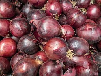 Full frame shot of onions for sale at market