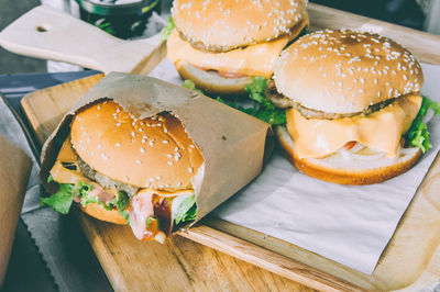 Close-up of burgers on table