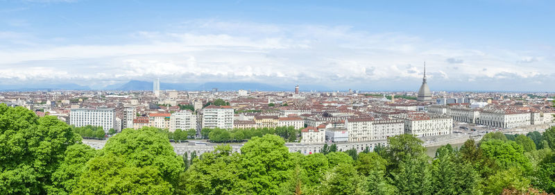 Extra wide angle aerial view of the skyline of turin with the mole antonelliana