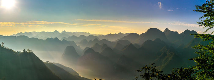 Scenic view of mountains against sky during sunset