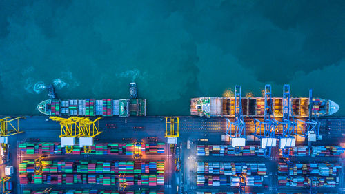 High angle view of container ship at commercial dock