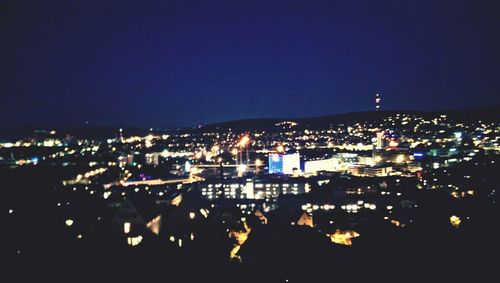 Illuminated cityscape at night