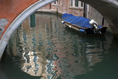 High angle view of boats moored in canal