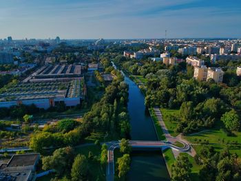 High angle view of river amidst buildings in city