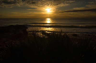 Scenic view of sea against sky during sunset