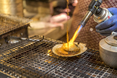Close-up of person preparing food