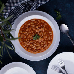 High angle view of food white beans in plate on table