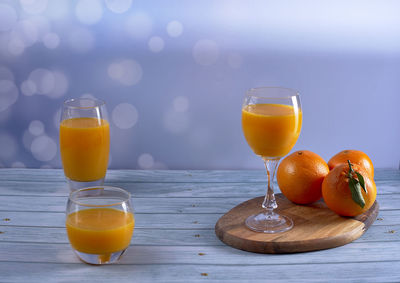 Orange juice on glass table