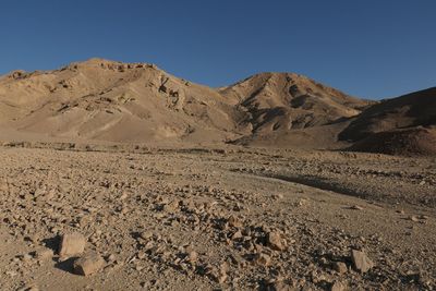 Scenic view of desert against clear sky