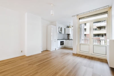 Interior of empty living room with hardwood flooring