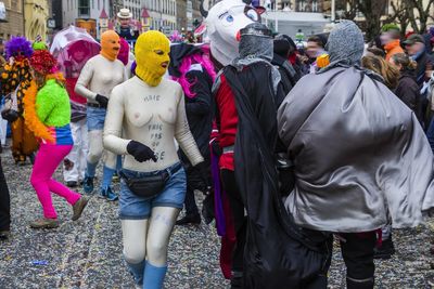 Group of people in costumes at carnival