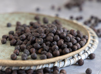 Close-up of coffee beans on table