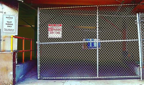 Text on closed metal fence