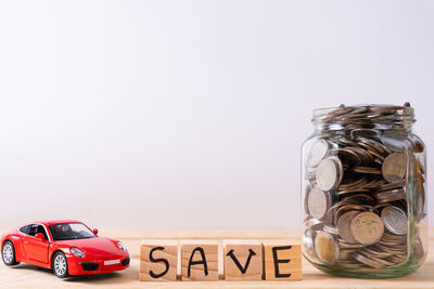 Close-up of vintage car against white background