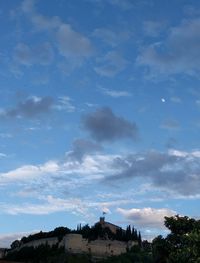 View of city against cloudy sky