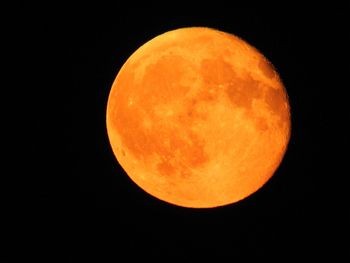 Scenic view of moon against sky at night