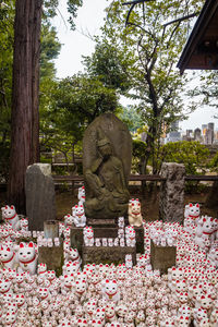 View of buddha statue in cemetery