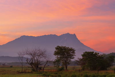 Scenic view of mountains against sky during sunset