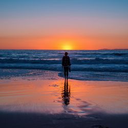 Scenic view of sea at sunset