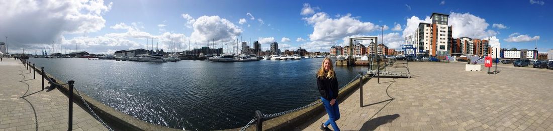 Panoramic view of harbor against sky