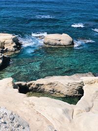 High angle view of rocks on beach