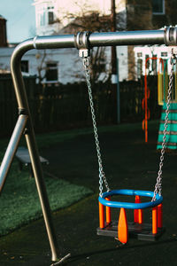 Close-up of swing in park