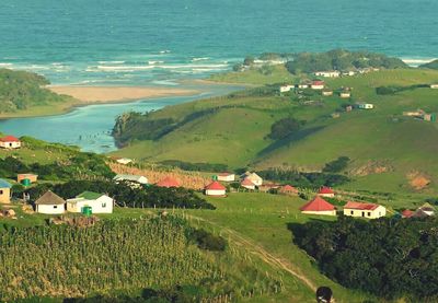 Scenic view of agricultural landscape and buildings