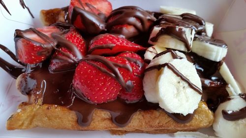 Close-up of chocolate cake with ice cream in plate