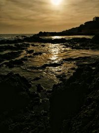 Scenic view of sea against dramatic sky