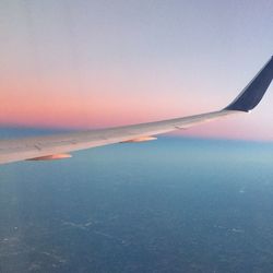 Scenic view of sea against sky at sunset