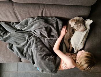 Midsection of woman with dog