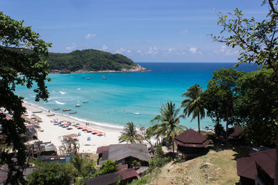 High angle view of swimming pool by sea against sky