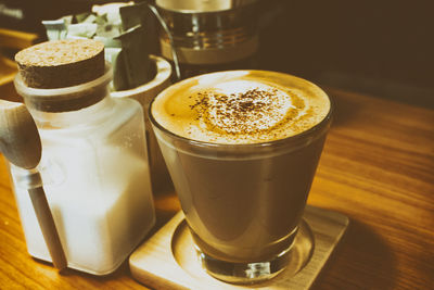 Close-up of cappuccino on table