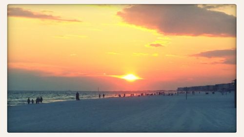 Scenic view of sea at sunset