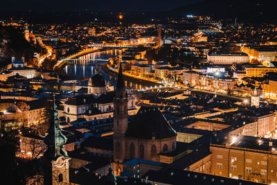 High angle view of illuminated cityscape at night