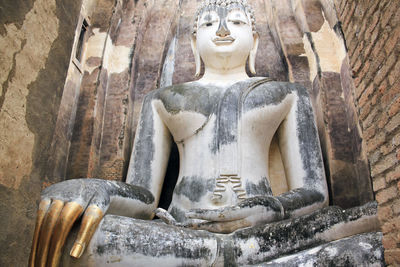 Low angle view of buddha statue