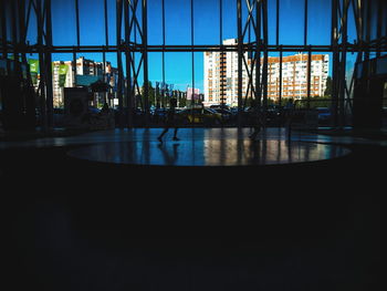 Reflection of modern building in water