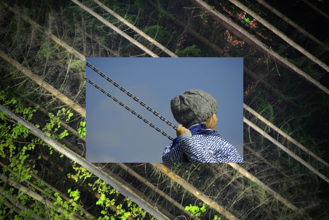 REAR VIEW OF BOY ON CAMERA