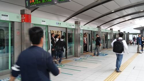 People waiting at subway station