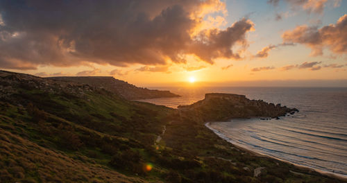 Scenic view of sea against sky during sunset