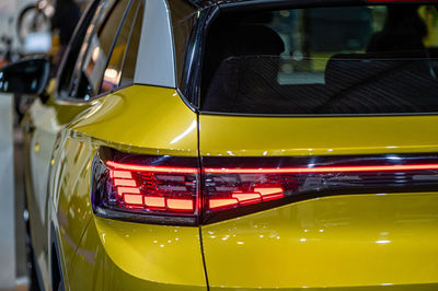 Rear led lights closeup of nev vw id4 electric suv, model 2021, stylish exterior design of new car